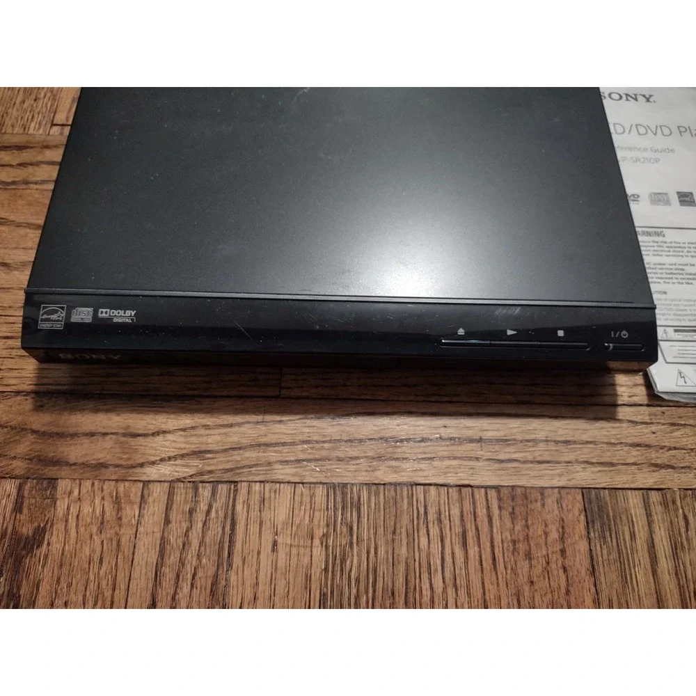 Sony DVP-SR210P Ultra Slim CD/DVD Player - Powers On / Ejects Includes Manual